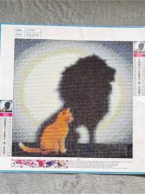 Finished Cat and Lion Silhouette Diamond Art - Orange Cat on Gray Background